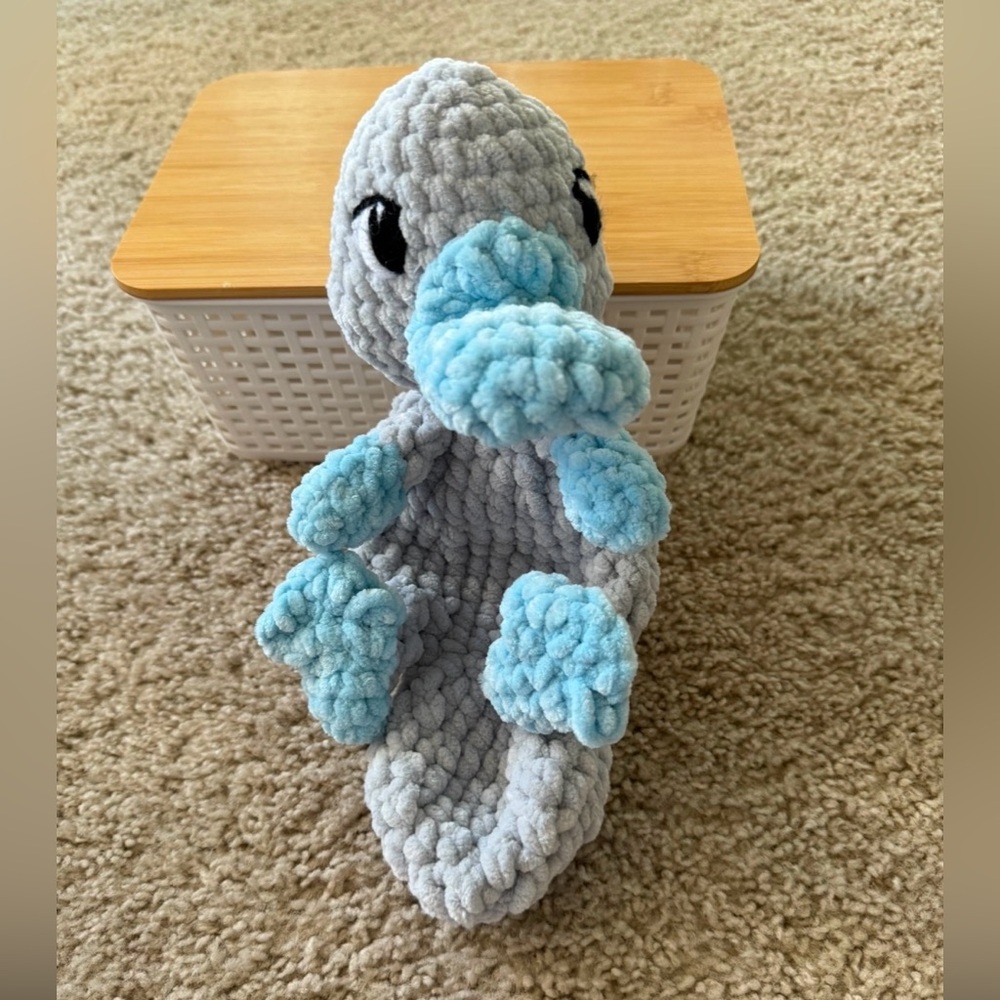 Handmade crochet platypus snuggler